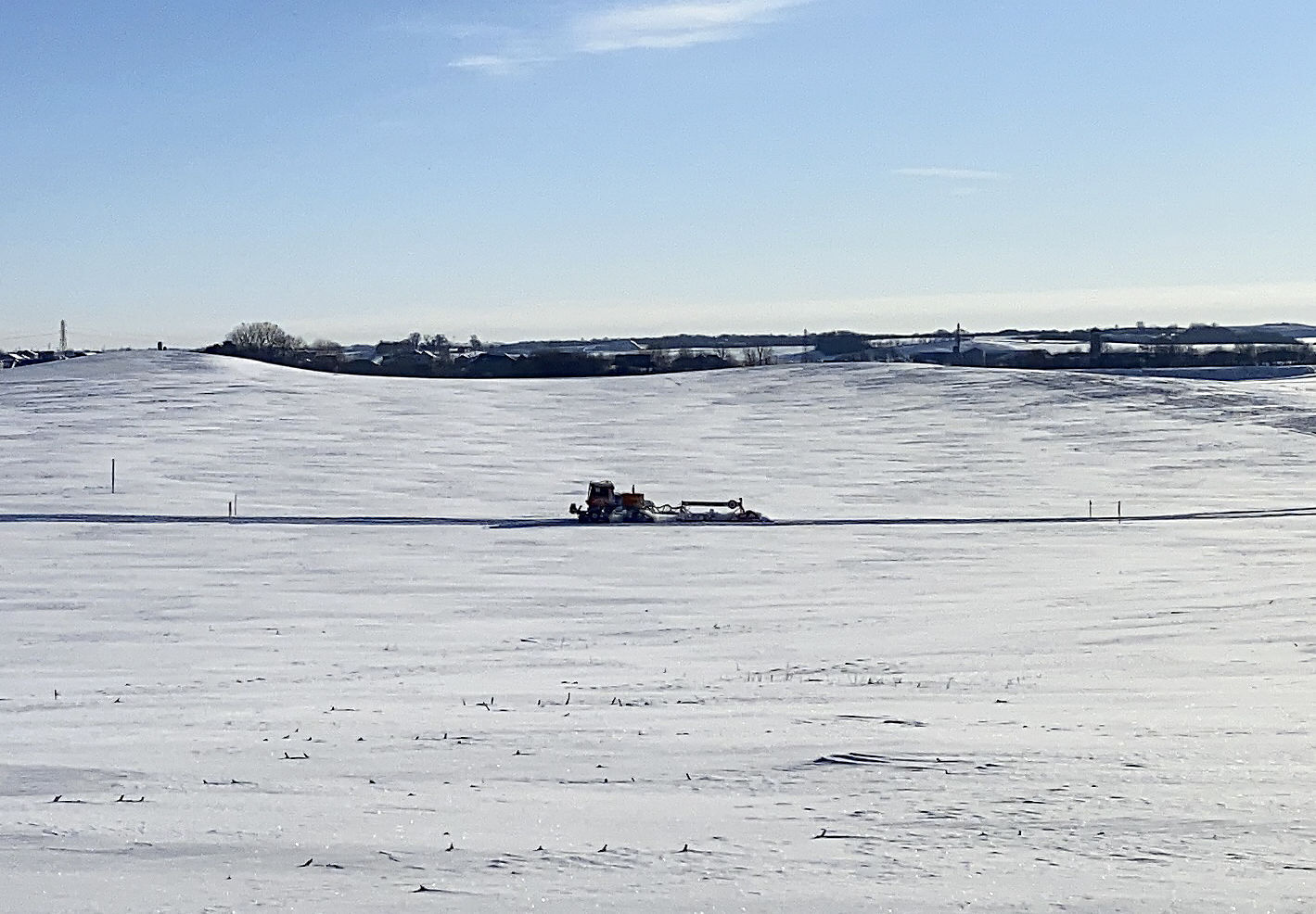 Grooming the snowmobile trail
